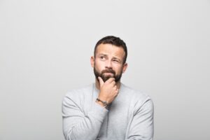 Man Thinking About Hiring HVAC Contractor